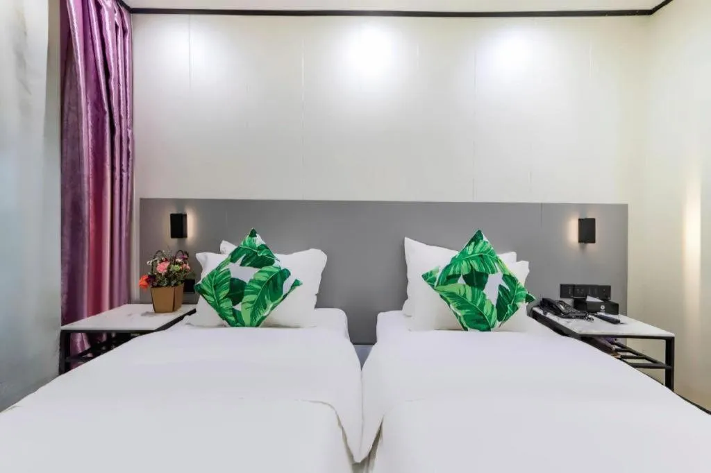 Bed in Xinghe Xinfeng Hotel Railway Station & Bus Station Branch