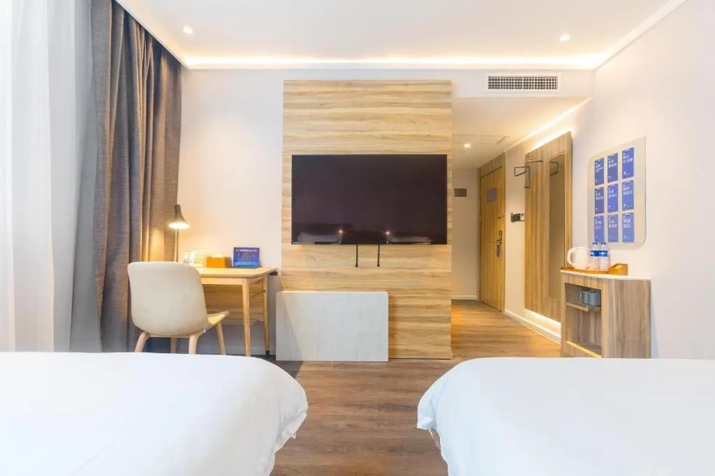 Bed in Hanting Premium Hotel Beijing Wudaokou East Gate of Tsinghua