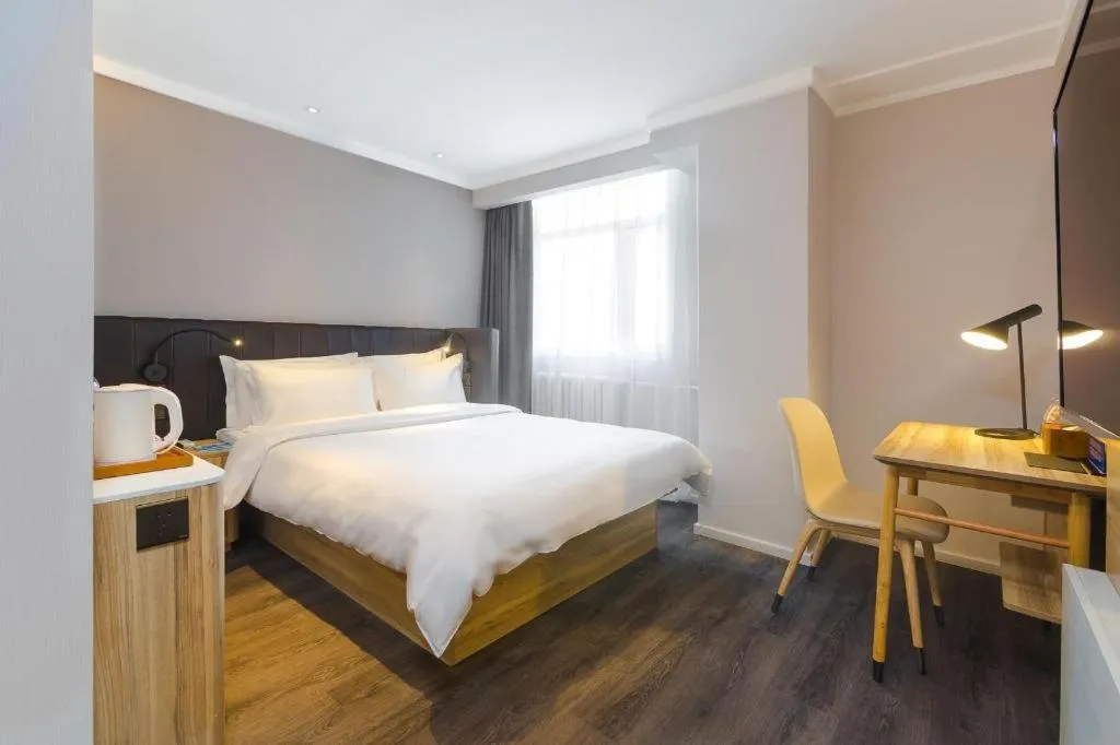 Bed in Hanting Premium Hotel Beijing Wudaokou East Gate of Tsinghua