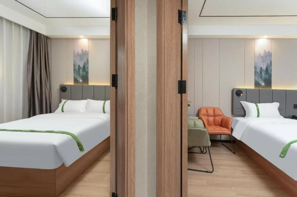 Bed in GreenTree Inn Jinan Quancheng Hotel