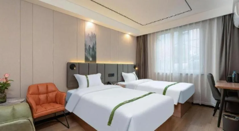 Bed in GreenTree Inn Jinan Quancheng Hotel