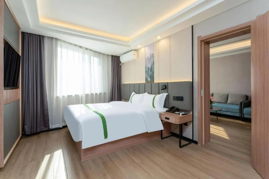 Bed in GreenTree Inn Jinan Quancheng Hotel