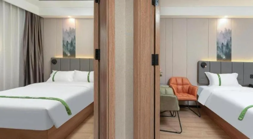 Bed in GreenTree Inn Jinan Quancheng Hotel