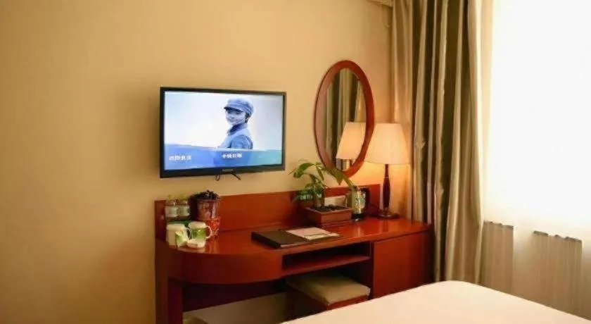 Bed in GreenTree Inn Jinan Quancheng Hotel