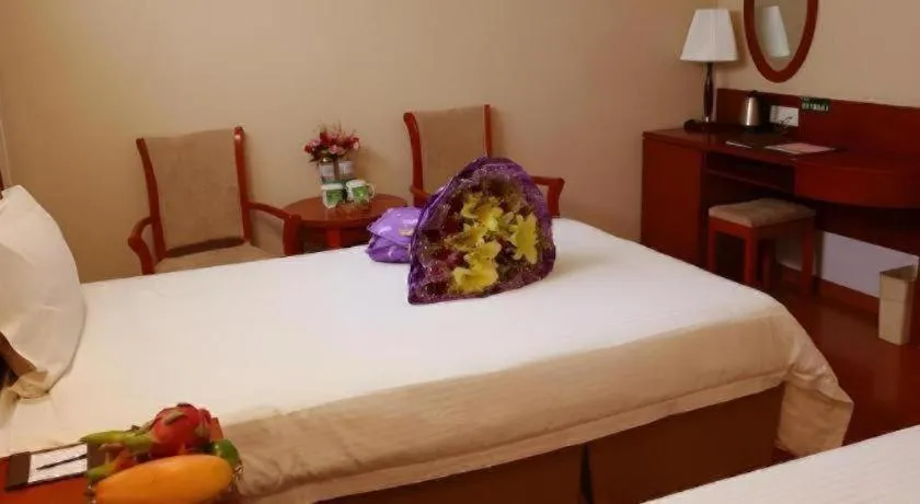 Bed in GreenTree Inn Jinan Quancheng Hotel