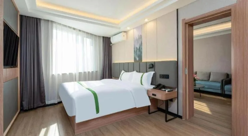 Bed in GreenTree Inn Jinan Quancheng Hotel