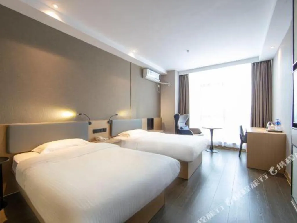 Bed in GreenTree Inn JiangSu NanJing South Railway Station South Square Express Hotel