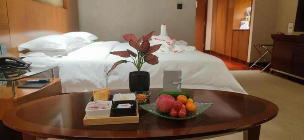 Bed in Shanxi World Trade Hotel