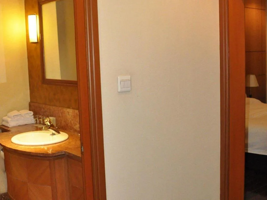 Bed in Shanxi World Trade Hotel