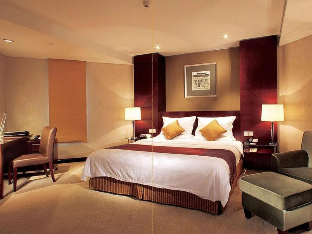 Bed in Shanxi World Trade Hotel