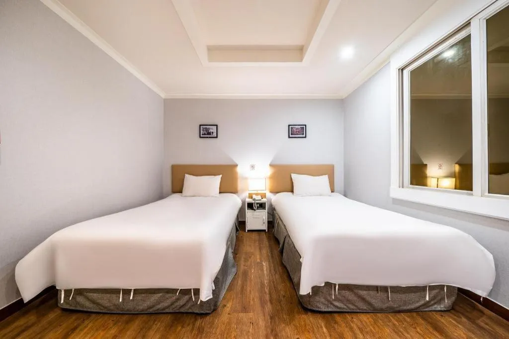 Bed in Check Inn Hotel