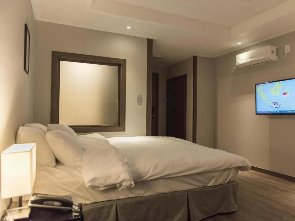 Bed in Check Inn Hotel