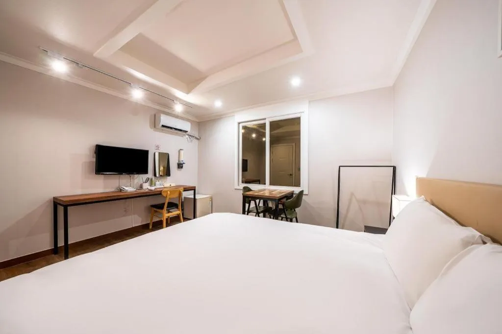 Bed in Check Inn Hotel