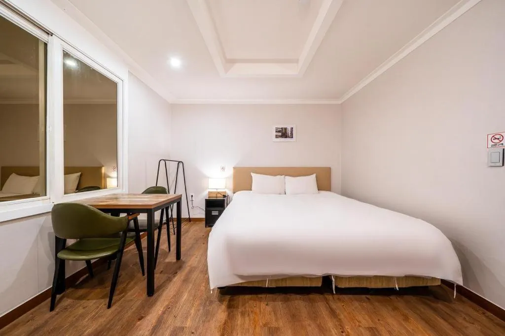 Bed in Check Inn Hotel