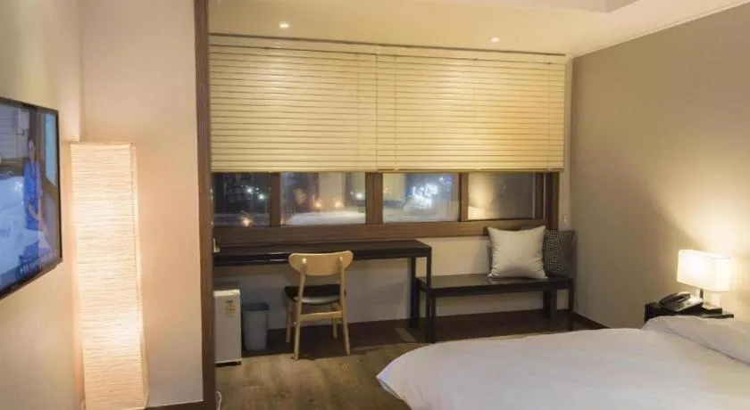 Bed in Check Inn Hotel