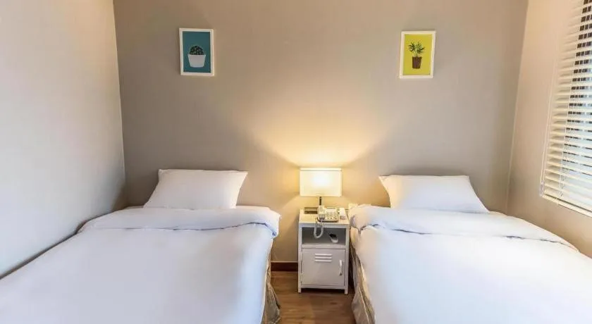 Bed in Check Inn Hotel