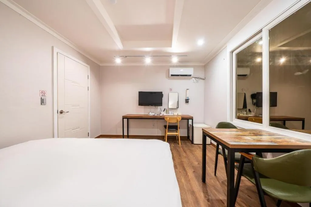 Bed in Check Inn Hotel