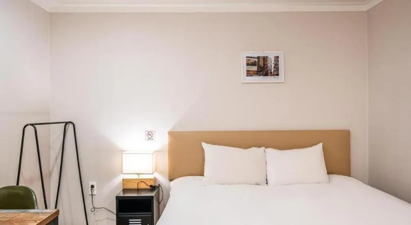 Bed in Check Inn Hotel