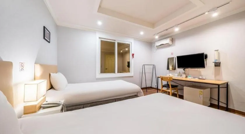 Bed in Check Inn Hotel