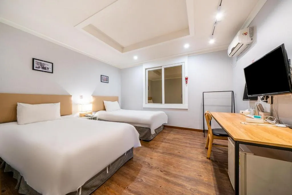 Bed in Check Inn Hotel