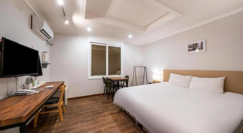 Bed in Check Inn Hotel