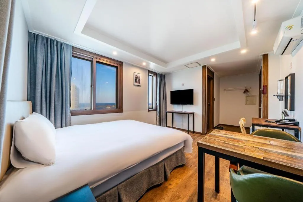 Bed in Check Inn Hotel