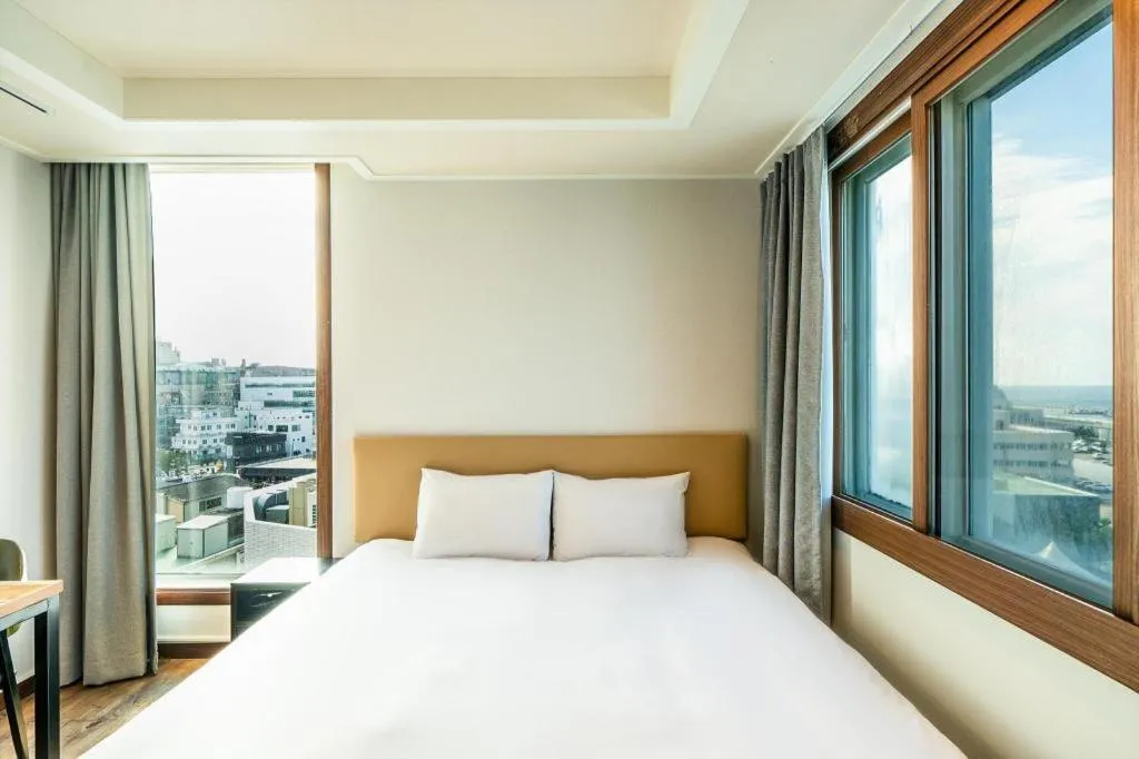 Bed in Check Inn Hotel