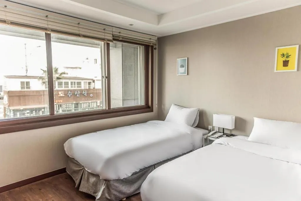 Bed in Check Inn Hotel