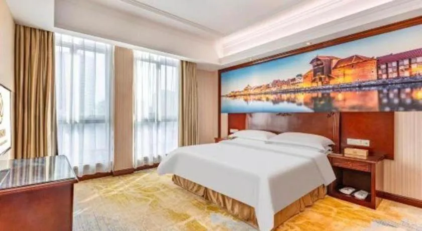 Bed in Vienna International Hotel Guangzhou Tianhe Olympic Stadium Dongpu