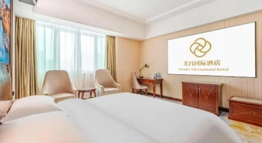 Bed in Vienna International Hotel Guangzhou Tianhe Olympic Stadium Dongpu