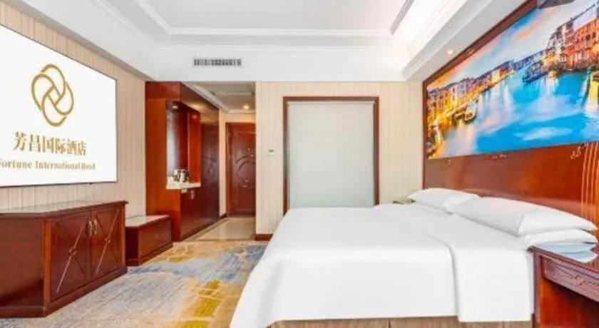 Bed in Vienna International Hotel Guangzhou Tianhe Olympic Stadium Dongpu