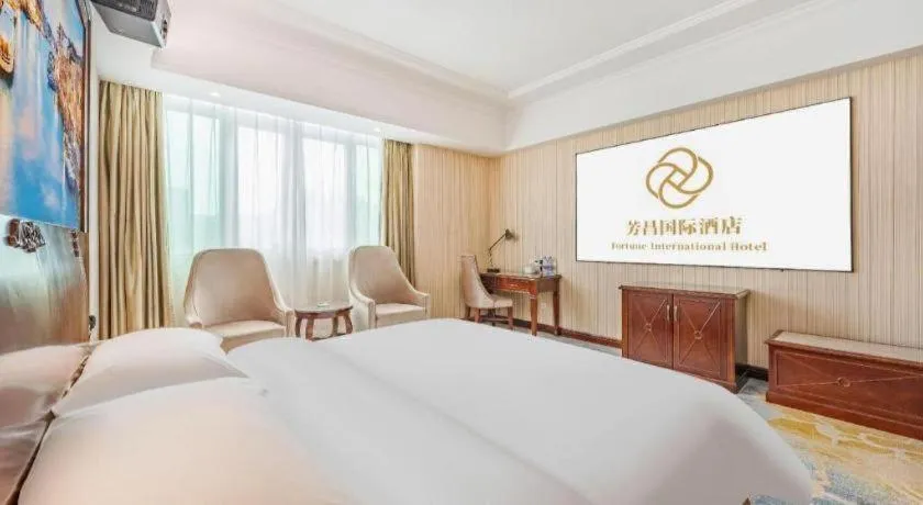 Bed in Vienna International Hotel Guangzhou Tianhe Olympic Stadium Dongpu