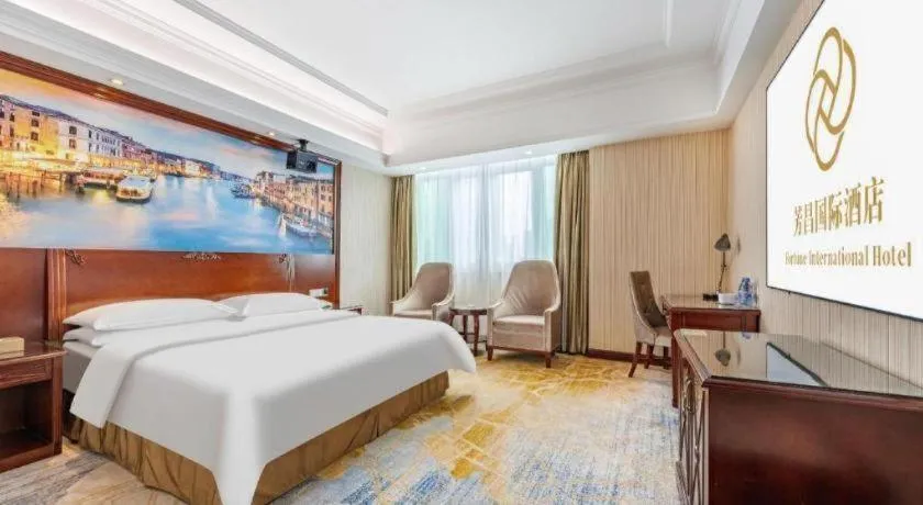 Bed in Vienna International Hotel Guangzhou Tianhe Olympic Stadium Dongpu
