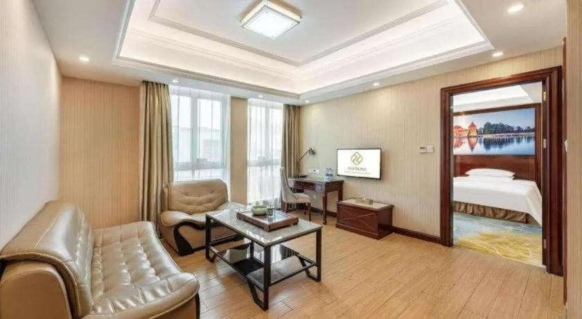 Bed in Vienna International Hotel Guangzhou Tianhe Olympic Stadium Dongpu