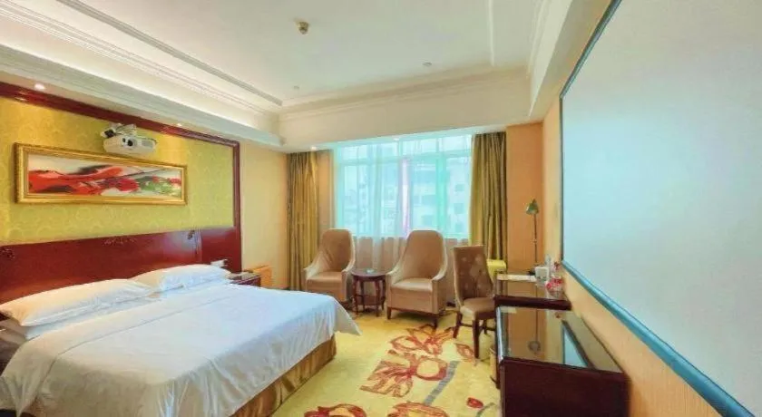Bed in Vienna International Hotel Guangzhou Tianhe Olympic Stadium Dongpu