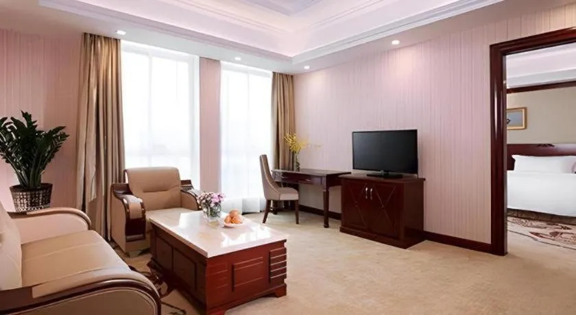 Bed in Vienna International Hotel Guangzhou Tianhe Olympic Stadium Dongpu
