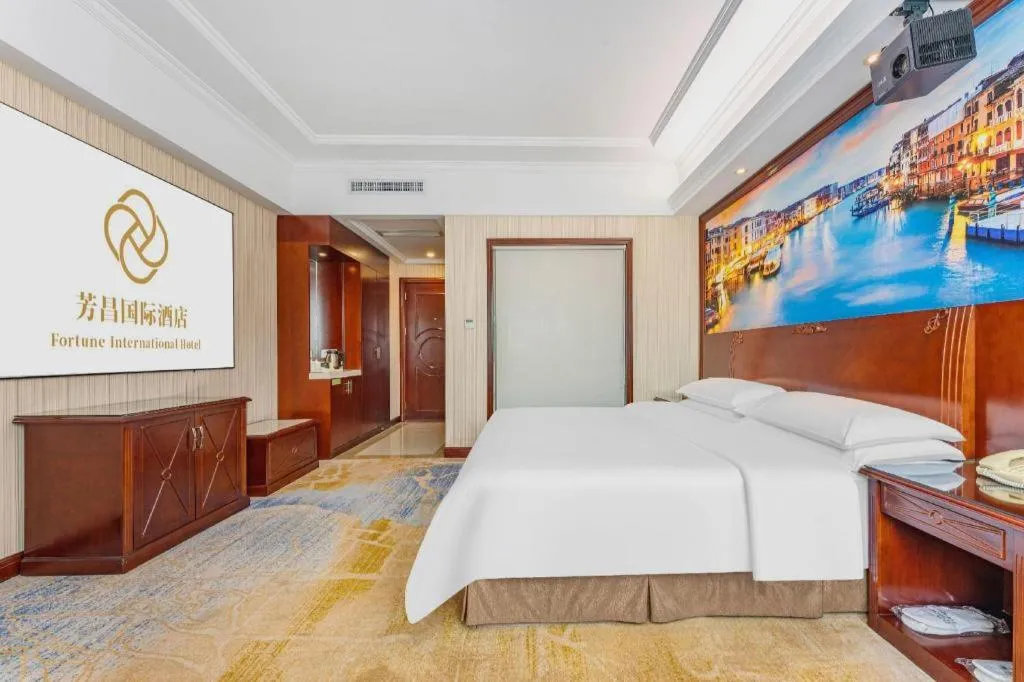 Bed in Vienna International Hotel Guangzhou Tianhe Olympic Stadium Dongpu
