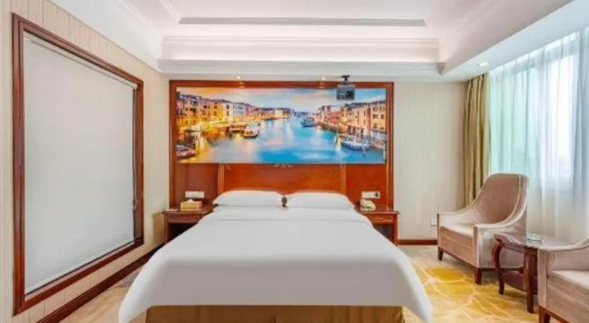 Bed in Vienna International Hotel Guangzhou Tianhe Olympic Stadium Dongpu