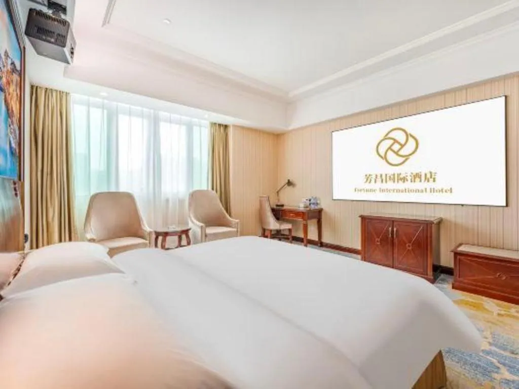 Bed in Vienna International Hotel Guangzhou Tianhe Olympic Stadium Dongpu