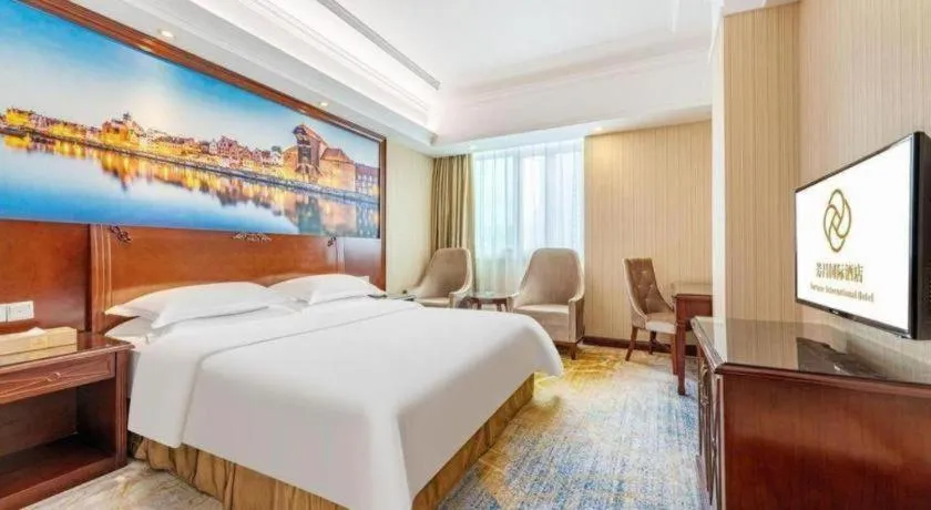 Bed in Vienna International Hotel Guangzhou Tianhe Olympic Stadium Dongpu
