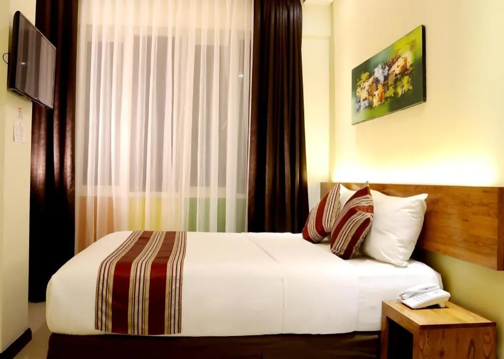 Bed in Biz Boulevard Hotel