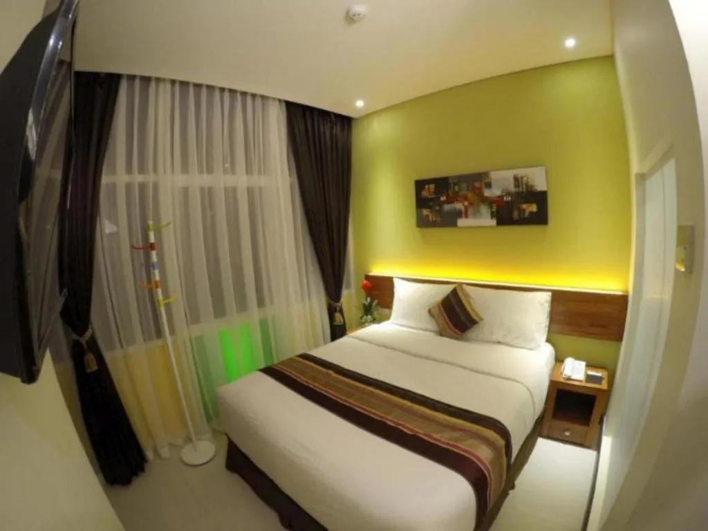 Bed in Biz Boulevard Hotel