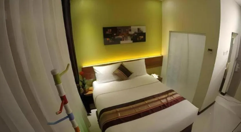 Bed in Biz Boulevard Hotel
