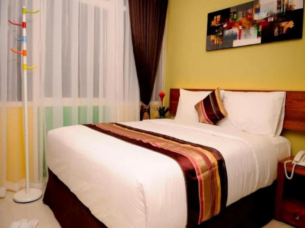 Bed in Biz Boulevard Hotel