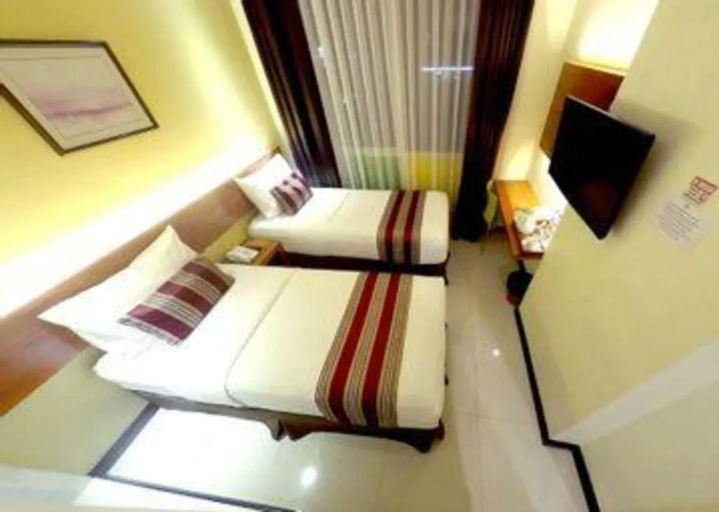 Bed in Biz Boulevard Hotel