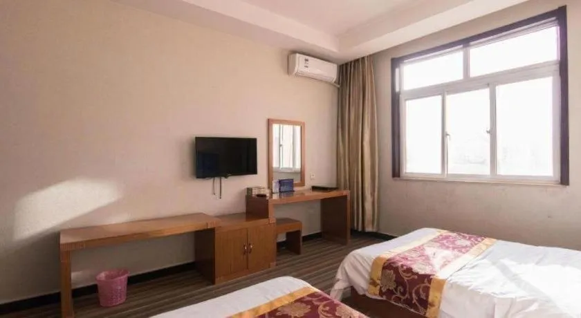 Bed in 169 Business Hotel