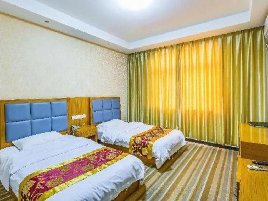 Bed in 169 Business Hotel