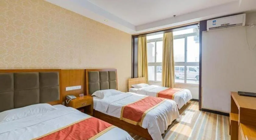 Bed in 169 Business Hotel