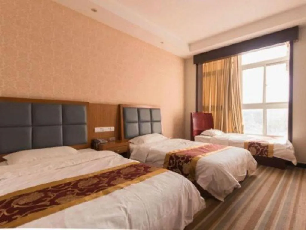 Bed in 169 Business Hotel