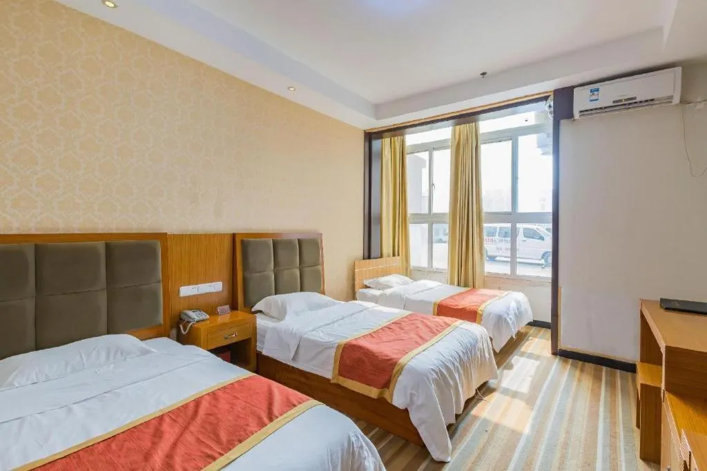 Bed in 169 Business Hotel